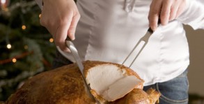 Carving Christmas Roast Turkey with all the Trimmings